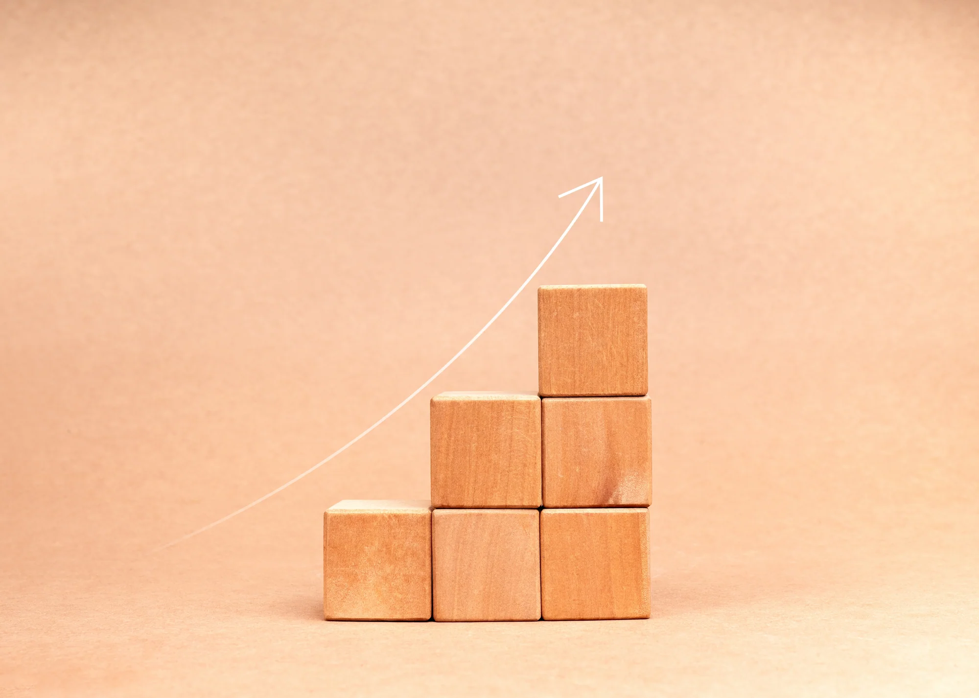 Wooden blocks arranged as an ascending chart